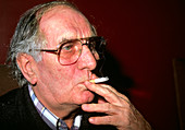 Elderly man smoking a cigarette