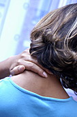 Woman with an aching neck