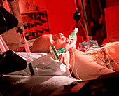 Man on respirator in cardiac intensive care