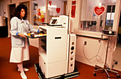 Helpmate robot carrying hospital meals