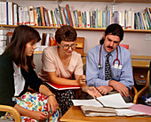 Hospital conference: staff discuss hospital issues