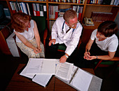 Hospital conference: staff discuss hospital issues