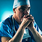 Male surgeon thinking