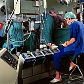 Surgeons performing coronary bypass surgery