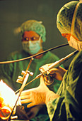 Neurosurgeon performs brain biopsy on a patient