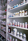 Pharmacy store: shelves filled with bottled drugs
