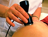Physiotherapist treats haematoma with ultrasound