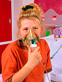 Cystic fibrosis patient using nebuliser