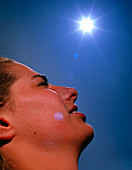 Woman's face with 'sun'