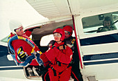 Hypnotherapist patients in parachute jump