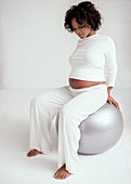 Pregnant woman with birthing ball