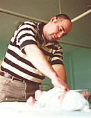 Father changing nappy