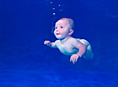 Baby swimming underwater