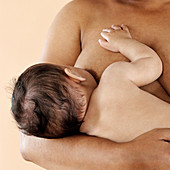 Baby girl breast feeding