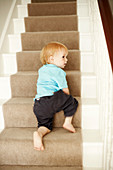 Boy climbing stairs