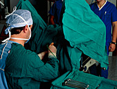 Surgeon performing D&C gynaecological operation