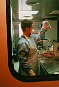 Dr Quentin Sattentau working in an AIDS laboratory