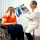 GP doctor shows X-ray to obese disabled teenager
