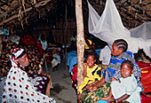 Family in village hospital ward,Tanzania
