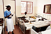 Nurse monitoring patients