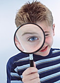 Eye through magnifying glass