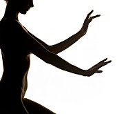 Silhouette of woman's torso and arms (side view)