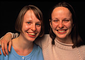 Portrait of identical twins in adolescence
