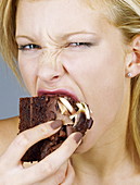 Woman eating cake