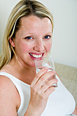 Pregnant woman drinking milk