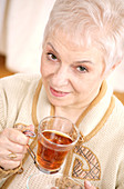 Woman drinking a herbal tea