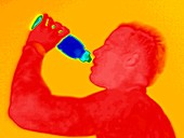 Man drinking from a bottle,thermogram