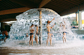 Children playing at a pool