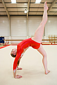 Gymnast performing a back walkover