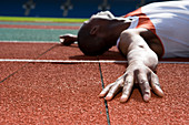 Athlete lying on the floor