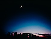 Stonehenge at twilight with crescent moon & Venus