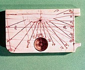 Portable sundial with a built in magnetic compass