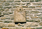 Sundial on the wall of a building