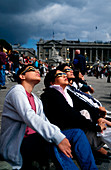 Watching a solar eclipse,Paris,France