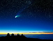 Hale-Bopp comet and telescope domes