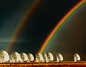 Rainbow over the dishes of the VLA radio telescope