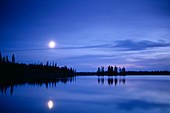 Moon over a lake