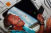 Astronaut Shriver eating M&Ms in space,STS-46
