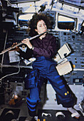 Astronaut Ochoa playing flute on Shuttle,STS-56