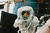 Astronaut spacewalks to repair Hubble Telescope