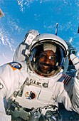 Astronaut Winston Scott performs a spacewalk