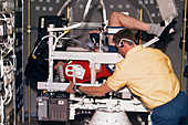 Astronaut in Neurolab off-axis rotator