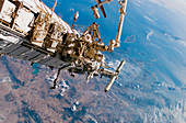 Astronauts spacewalking off the ISS