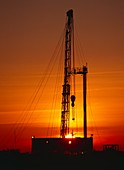 Sunset at an onshore gas drilling rig