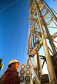 Technician at an onshore gas drilling rig