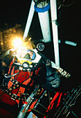 Saturation diver wearing helmet